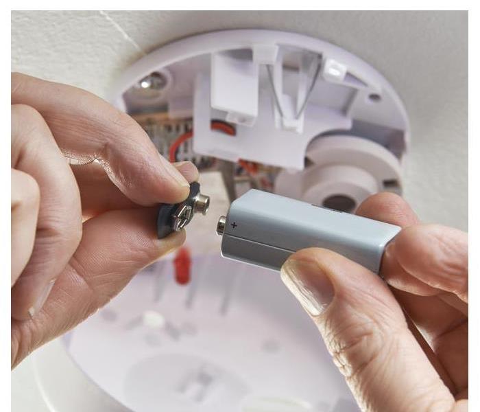 Changing battery to a smoke detector